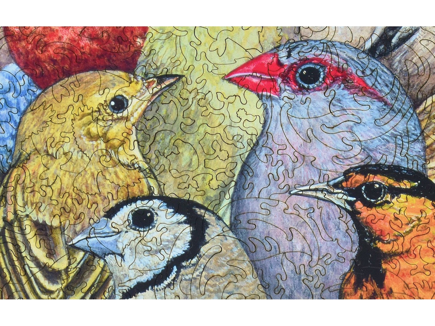 A closeup of the front of the puzzle, Patchwork Birds, showing the detail in the pieces.