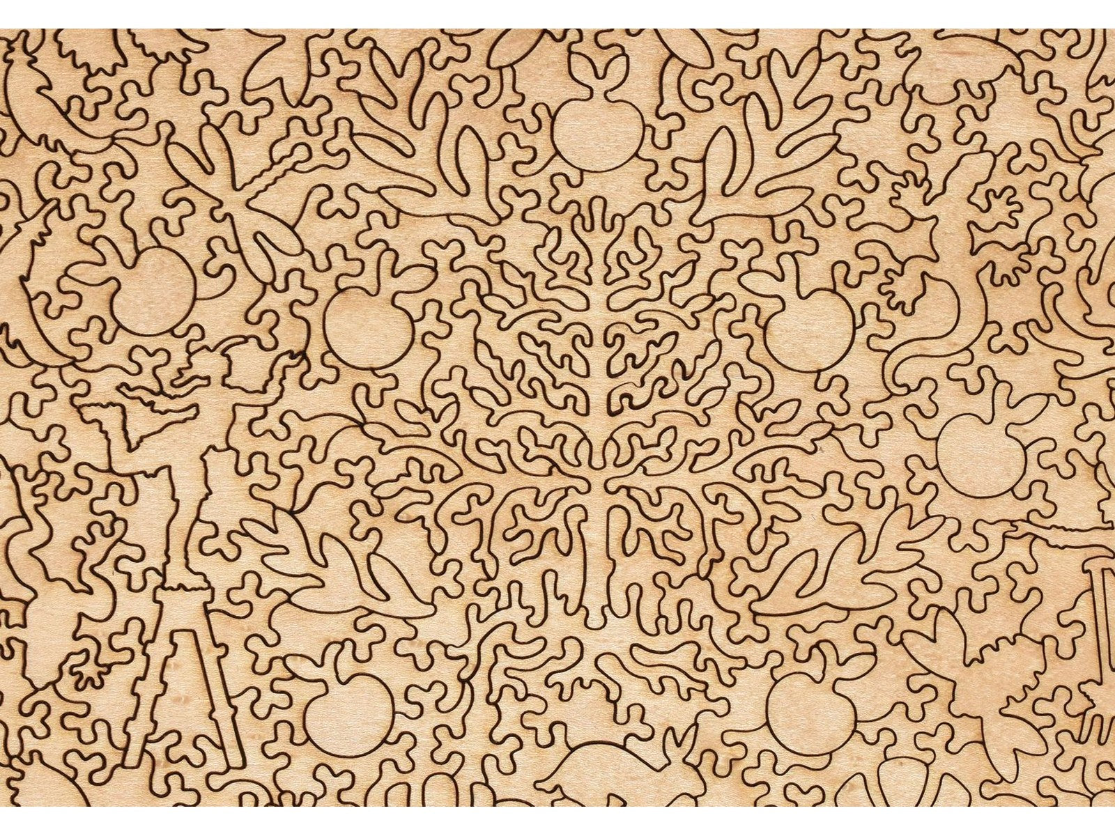 A closeup of the back of the puzzle, Plum Tree, showing the detail in the pieces.