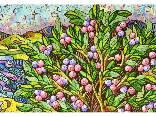 A closeup of the front of the puzzle, Plum Tree, showing the detail in the pieces.