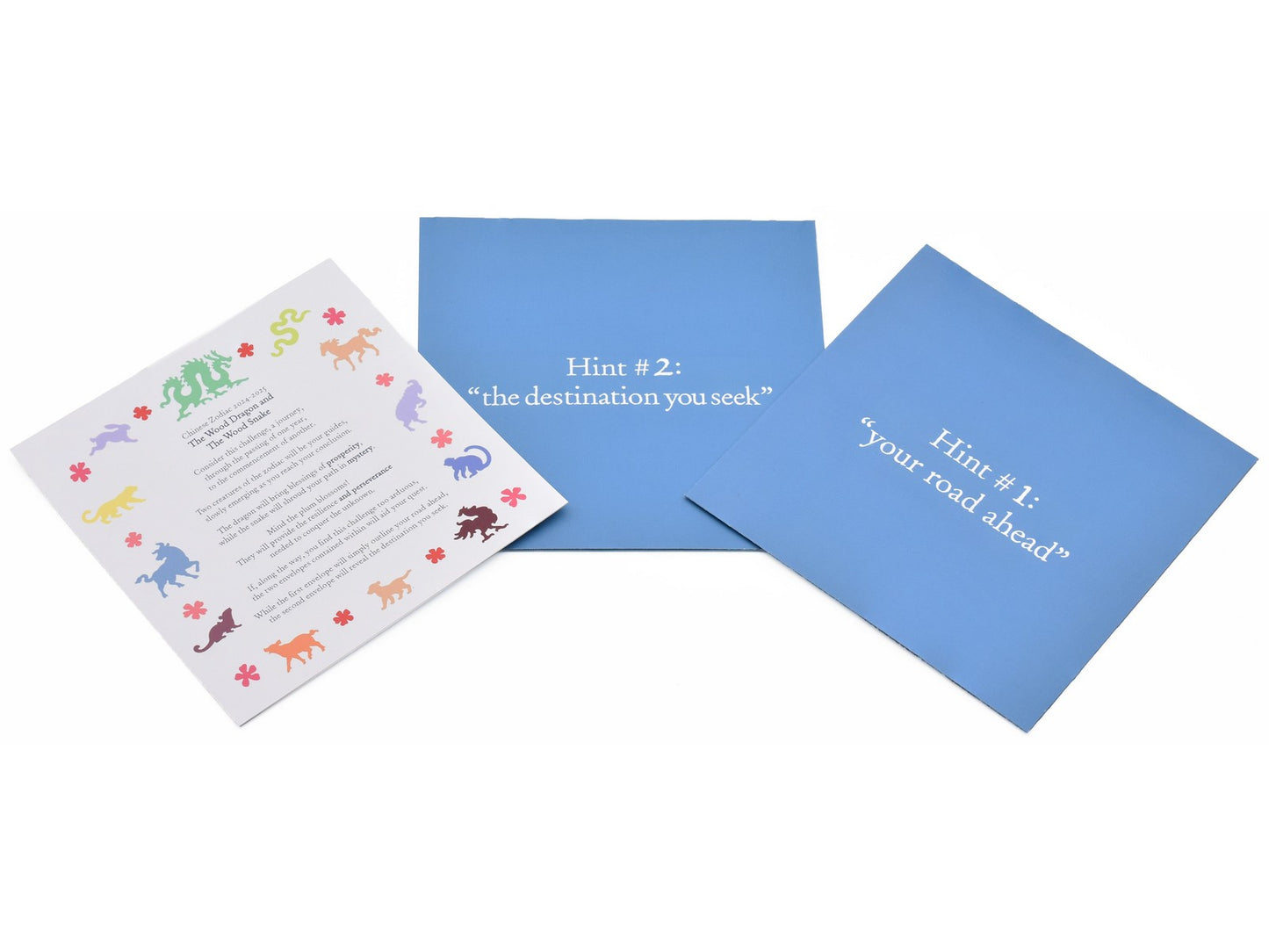 The insert and hint envelopes that will be included in the box.