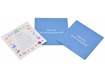 The insert and hint envelopes that will be included in the box.