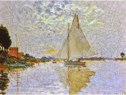 The front of the puzzle for Monet's Sailboat at Le Petit Gennevilliers showing a sailboat in the water.