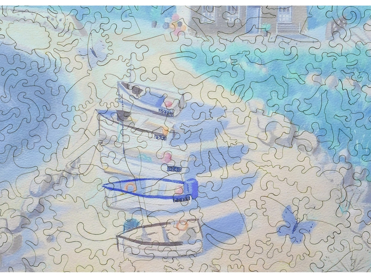 A closeup of the front of the puzzle, Sea Cottage, showing the detail in the pieces.