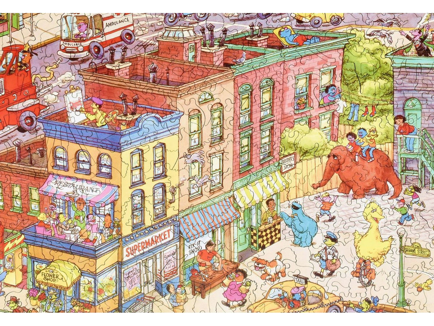 A closeup of the front of the puzzle, Sesame Street in the City, showing the detail in the pieces.