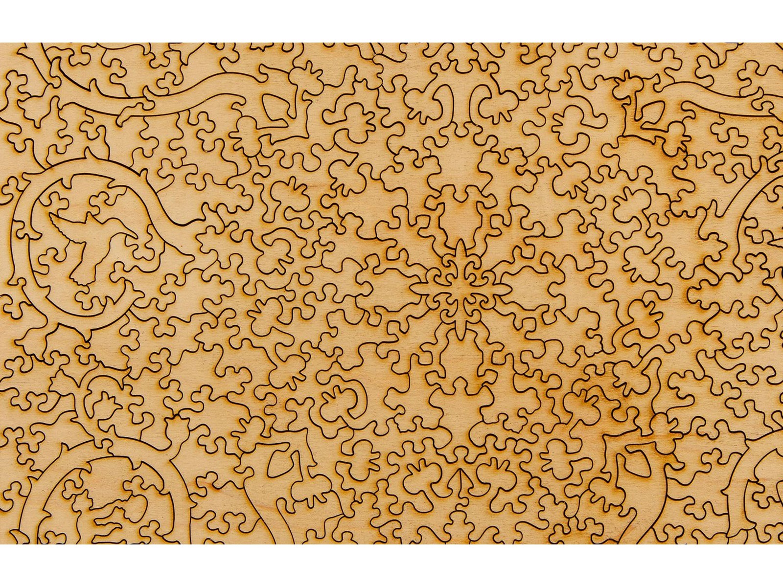 A closeup of the back of the puzzle, Shamsa Sunburst, showing the detail in the pieces.