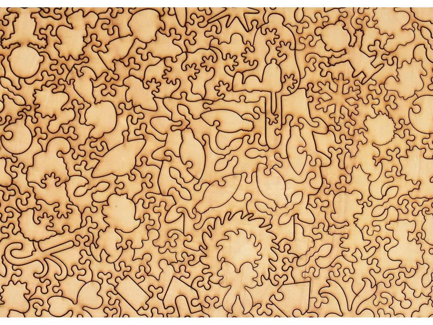 A closeup of the back of the puzzle, Snoopy's Christmas Dream, showing the detail in the pieces.