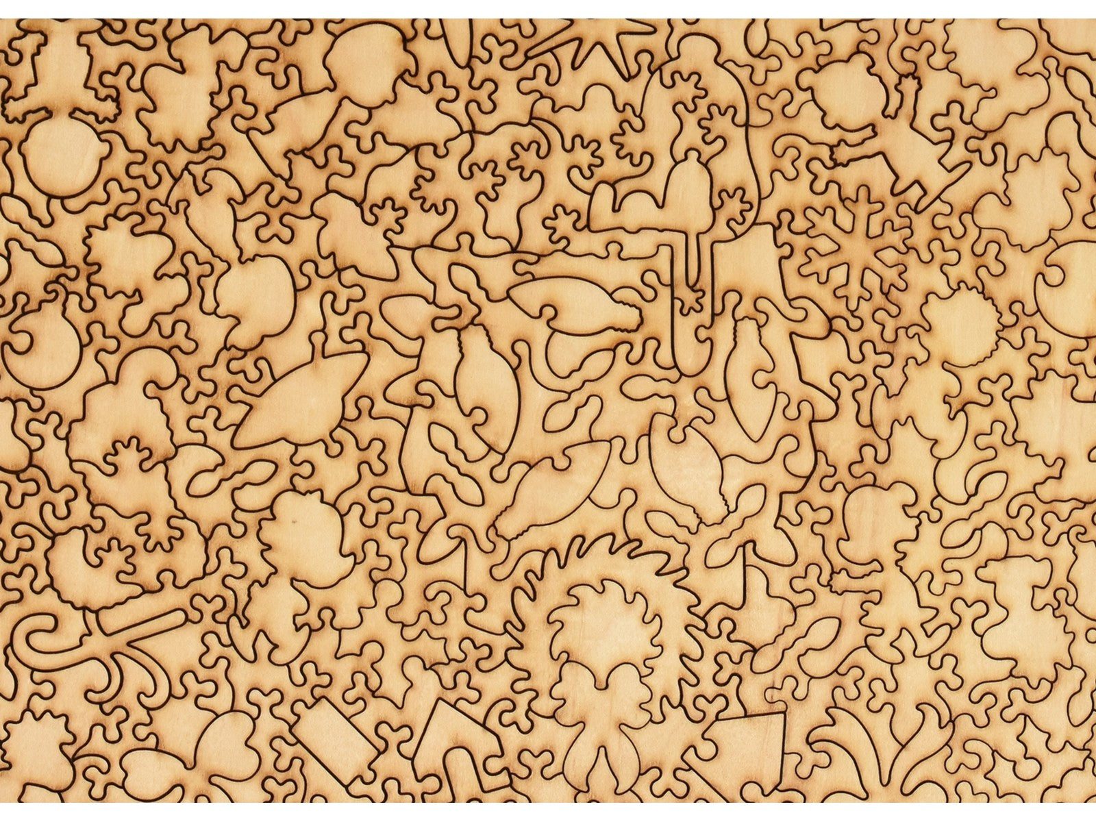 A closeup of the back of the puzzle, Snoopy's Christmas Dream, showing the detail in the pieces.