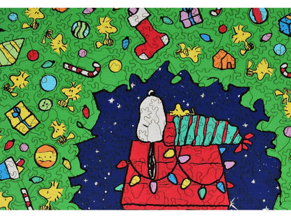 A closeup of the front of the puzzle, Snoopy's Christmas Dream, showing the detail in the pieces.