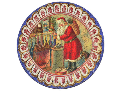 The front of the puzzle, Stockings by the Fire, which shows Santa Claus putting gifts into stockings on a fireplace, with a decorative border.