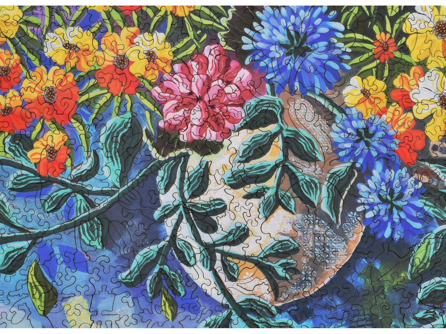 A closeup of the front of the puzzle, Summer Geraniums, showing the detail in the pieces.