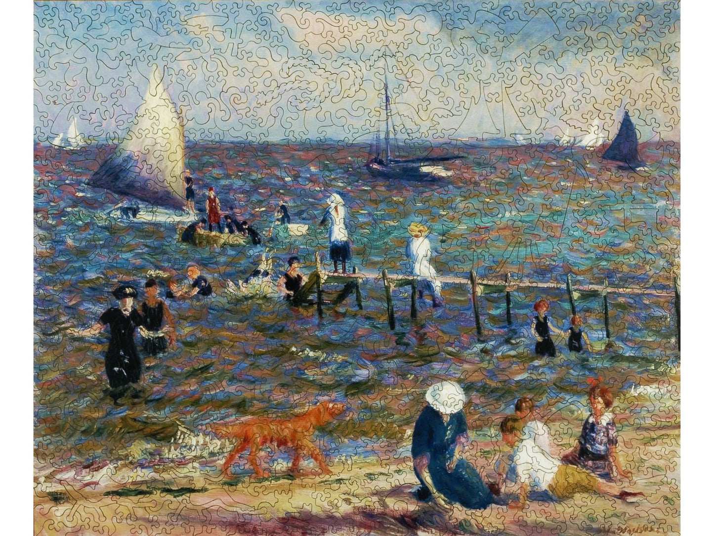 The front of the puzzle, The Little Pier, showing several people playing on the beach and swimming, and sailboats on the ocean.