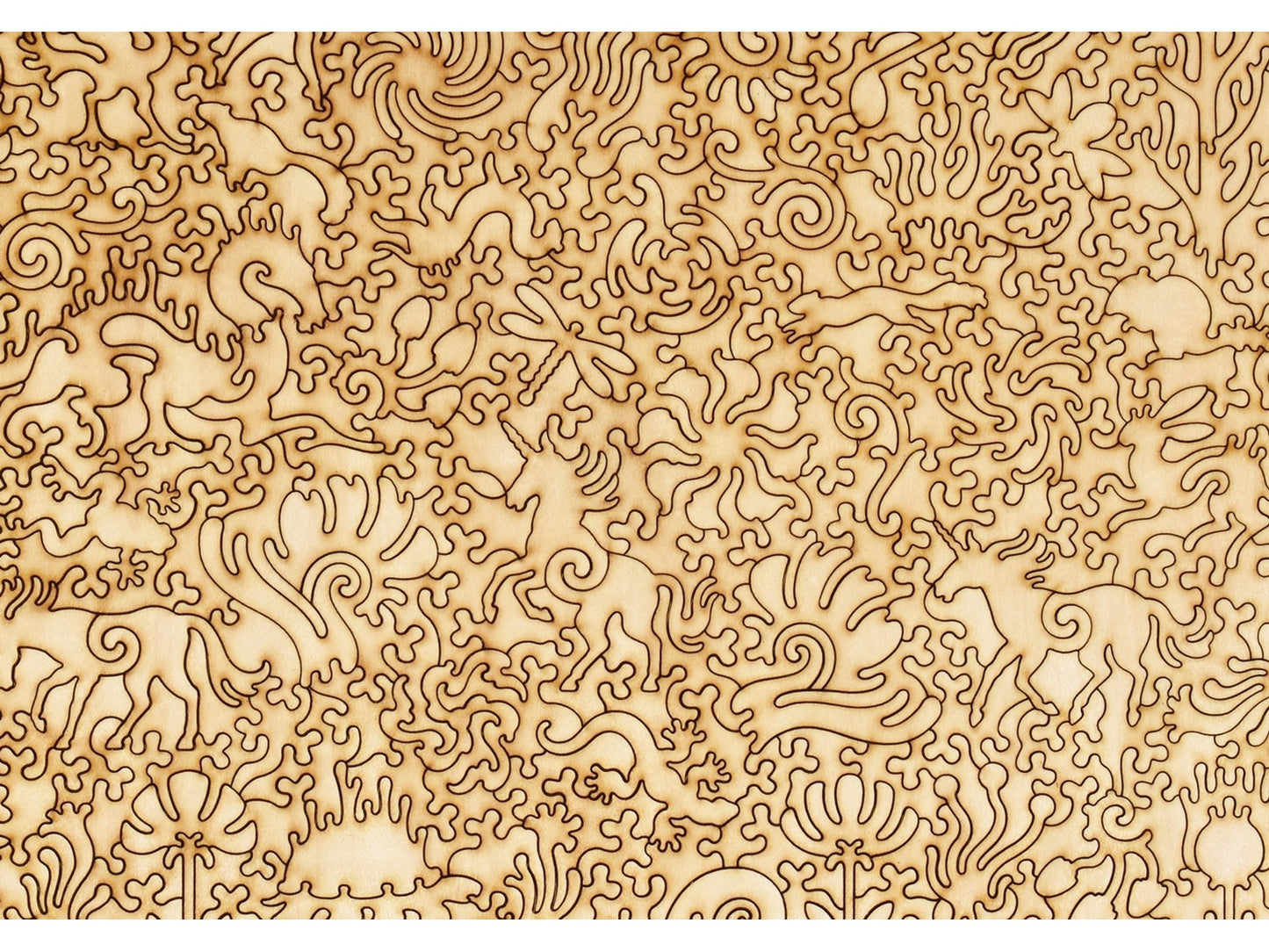 A closeup of the back of the puzzle, Three Unicorns by a Tree, showing the detail in the pieces.