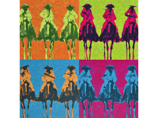 The front of the puzzle, Vaqueros Andres by Duke Beardsley, showing cowboys on a colorful background.