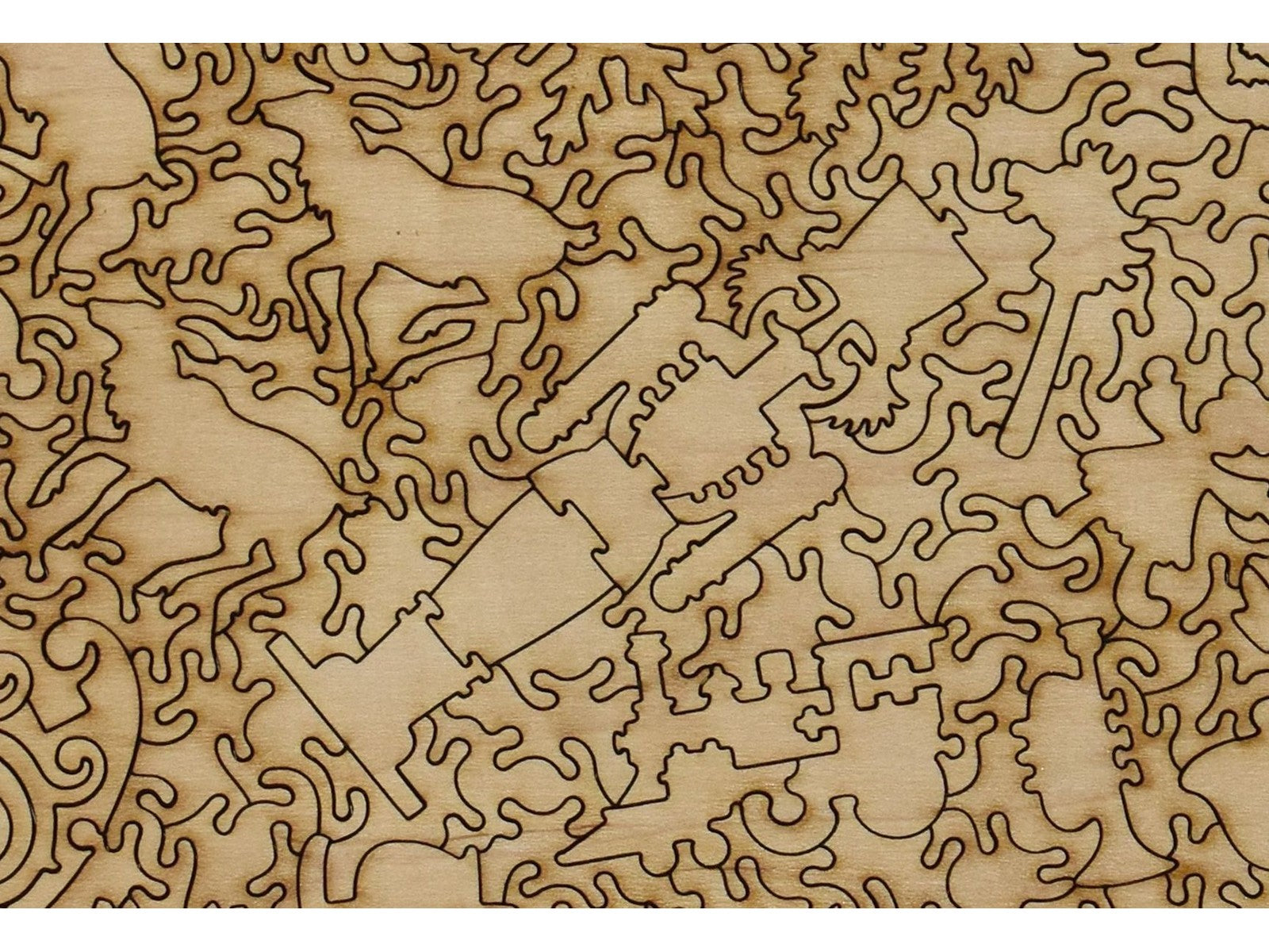 A closeup of the back of the puzzle, What Santa Claus Brings showing the detail in the pieces.