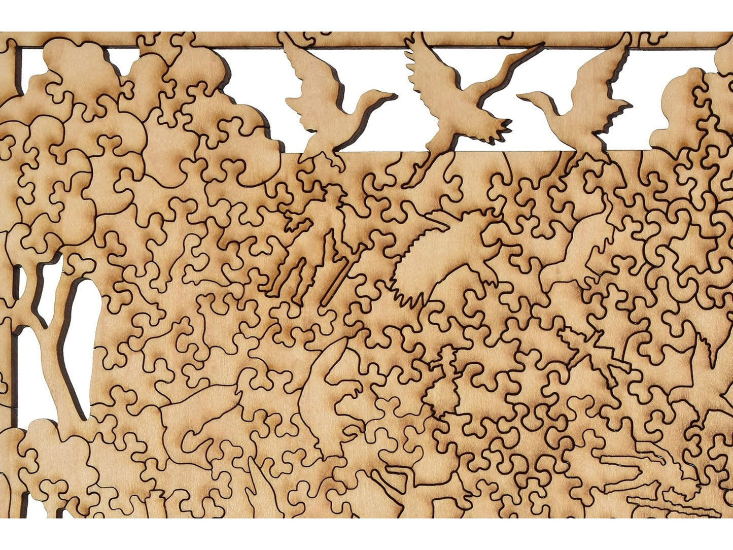 A closeup of the back of the puzzle, Whimsical Birds, showing the detail in the pieces.