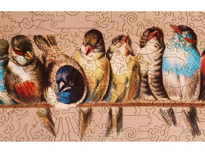 A closeup of the front of the puzzle, A Perch of Birds, showing the detail in the pieces.