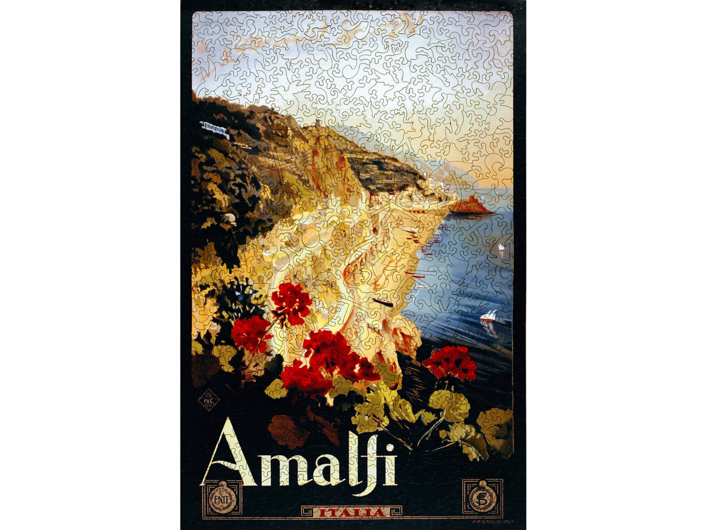 The front of the puzzle, Amalfi, showing a landscape of the Italian coastline with red flowers in the foreground.