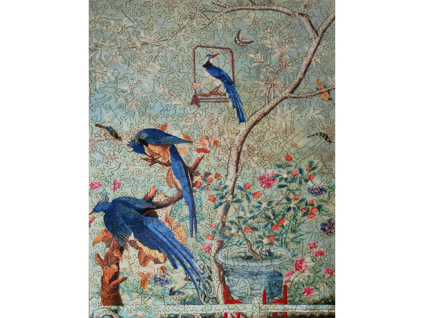 The front of the puzzle, The Chinese Drawing Room at Temple Newsam House, which shows blue birds on a tree.
