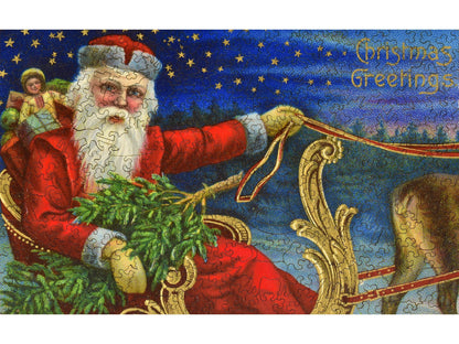 The front of the puzzle, Christmas Greetings, which shows Santa in a sleigh.