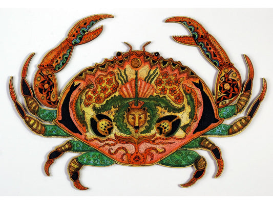 The front of the puzzle, Crab, which shows various plants and animals drawn within the shape of an orange crab.