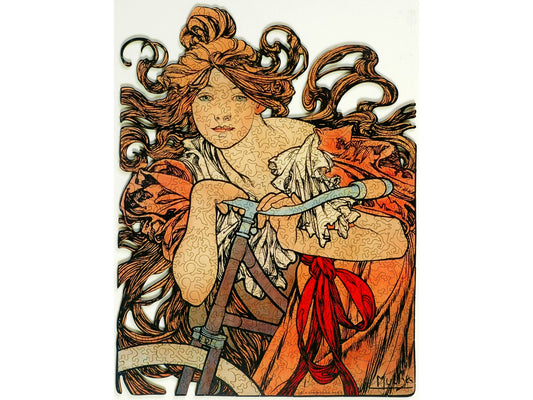 The front of the puzzle, Cycles Perfecta, which shows a woman with flowing hair on a bicycle.