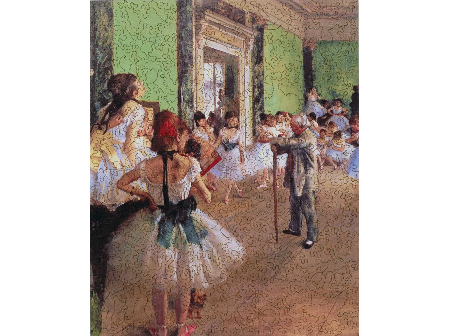 The front of the puzzle, La Classe de Danse, an impressionist scene, picturing an older man teaching a group of young ballerinas in a green room.