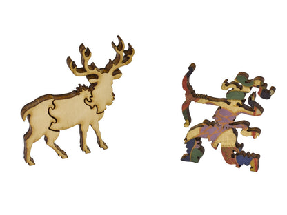 A closeup of pieces in the shape of a deer and a huntress.