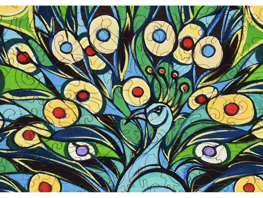 A closeup of the front of the puzzle, Emerald Isle Peacock, showing the detail in the pieces.