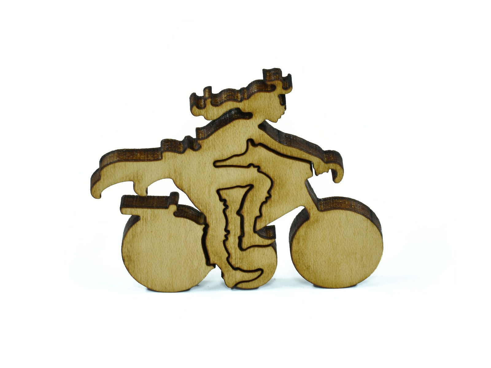 A closeup of pieces in the shape of a person riding a bicycle.
