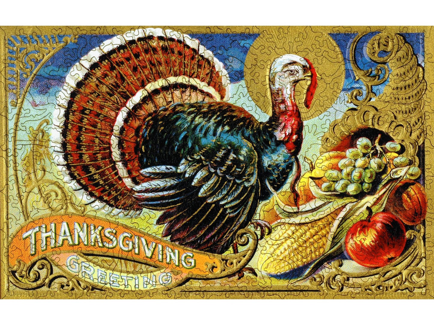 The front of the puzzle, Golden Turkey, showing a male turkey surrounded by harvested fruits and vegetables, and a banner with the words, Thanksgiving Greetings.
