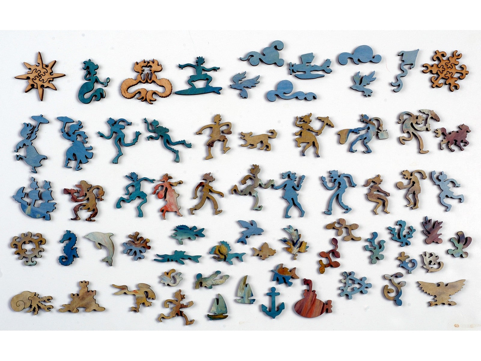 The whimsy pieces that can be found in the puzzle, Figures on the Beach.