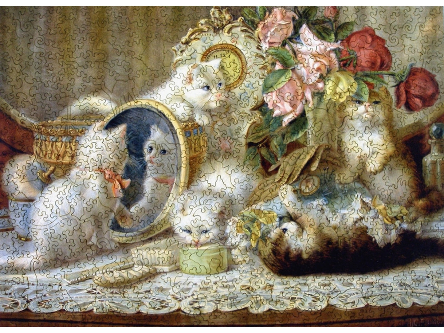 The front of the puzzle, The Five Senses, which shows five kittens playing.