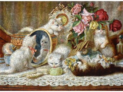 The front of the puzzle, The Five Senses, which shows five kittens playing.