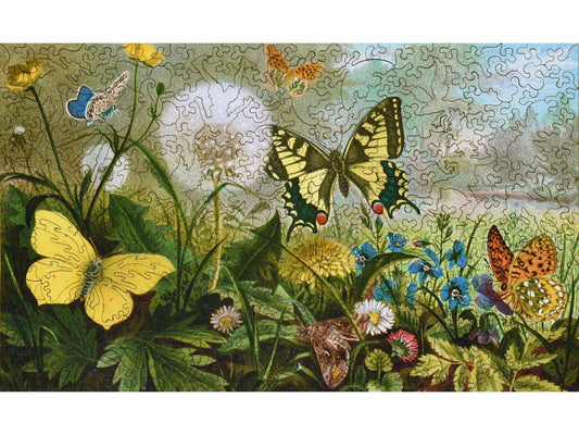 The front of the puzzle, German Butterflies, which shows different kinds of butterflies next to some flowers.