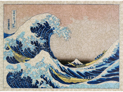 The front of the puzzle, The Great Wave off Kanagawa, which shows people in boats on a stormy sea, and one huge wave.