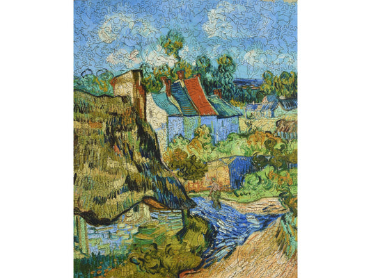 The front of the puzzle, Houses at Auvers, which shows a farming village in the French countryside.