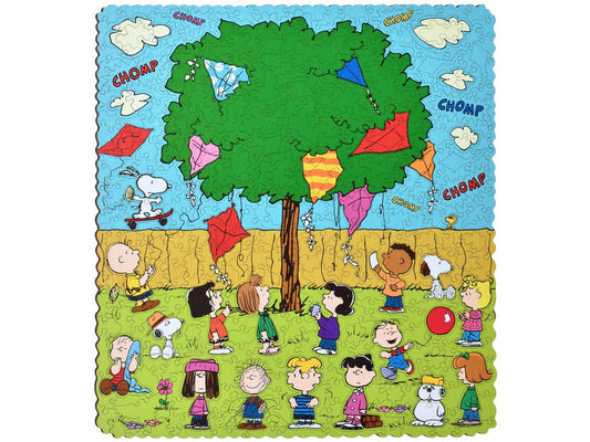 The front of the puzzle, Kite-Eating Tree, with all of the Peanuts characters and the Kite Eeating Tree.