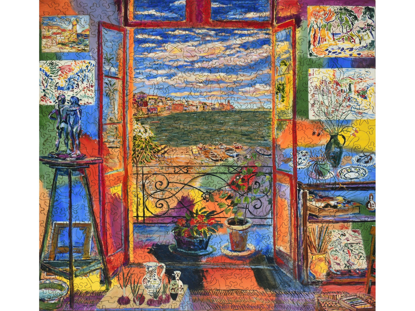 The front of the puzzle, Matisse's Studio, which shows an art studio with an ocean view.