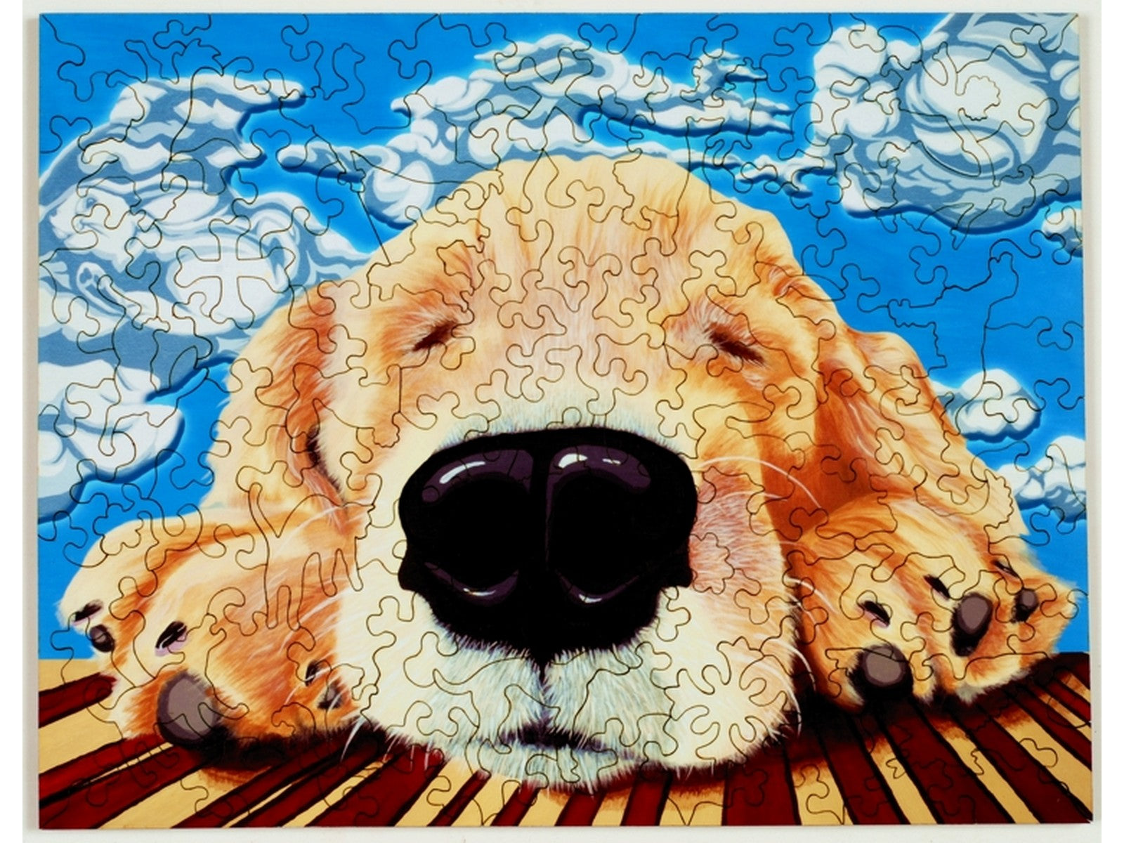 The front of the puzzle, Merlin, which shows a puppy sleeping.