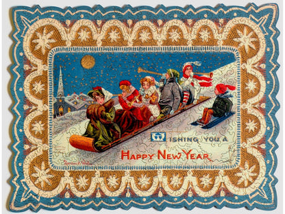 The front of the puzzle, New Year's Toboggan, which shows a group of people sledding down a snowy hill, with a decorative border.