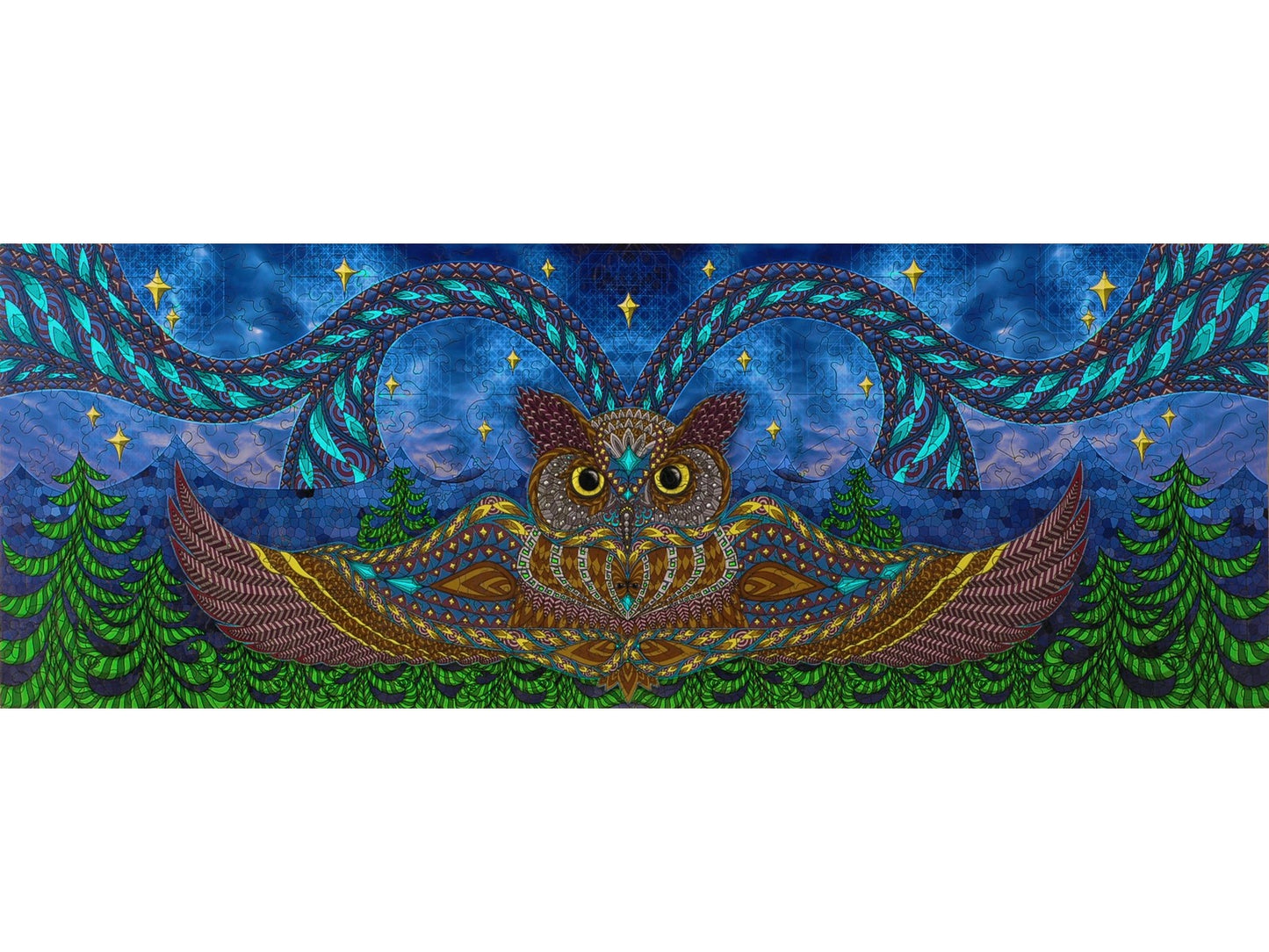 The front of the puzzle, Owl Eyes, which shows a colorful night scene with a great horned owl.
