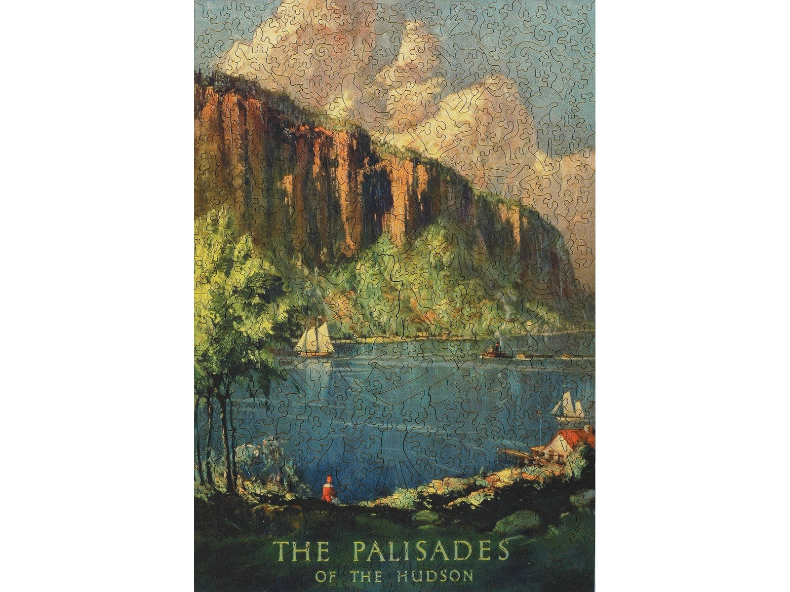 The front of the puzzle, The Palisades of the Hudson, which shows boats on a river, surrounded by cliffs.