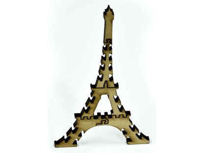 A closeup of pieces that go together to make the Eiffel Tower.