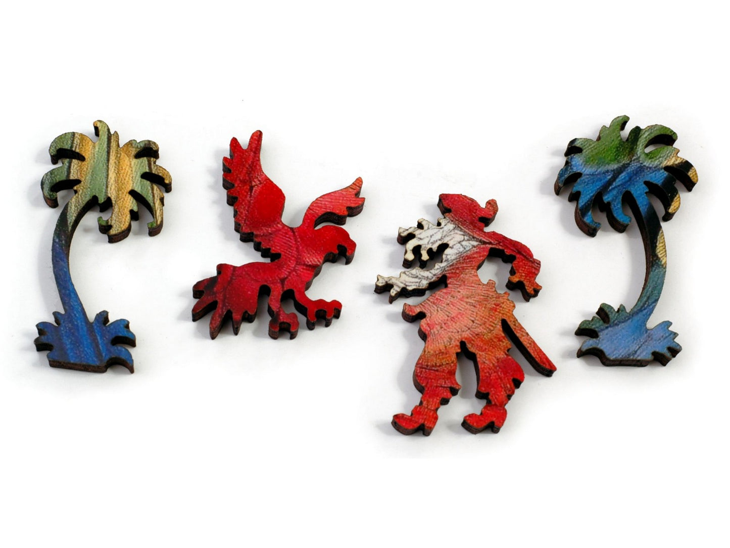 A closeup of pieces, in the shapes of a pirate, a parrot, and two palm trees.