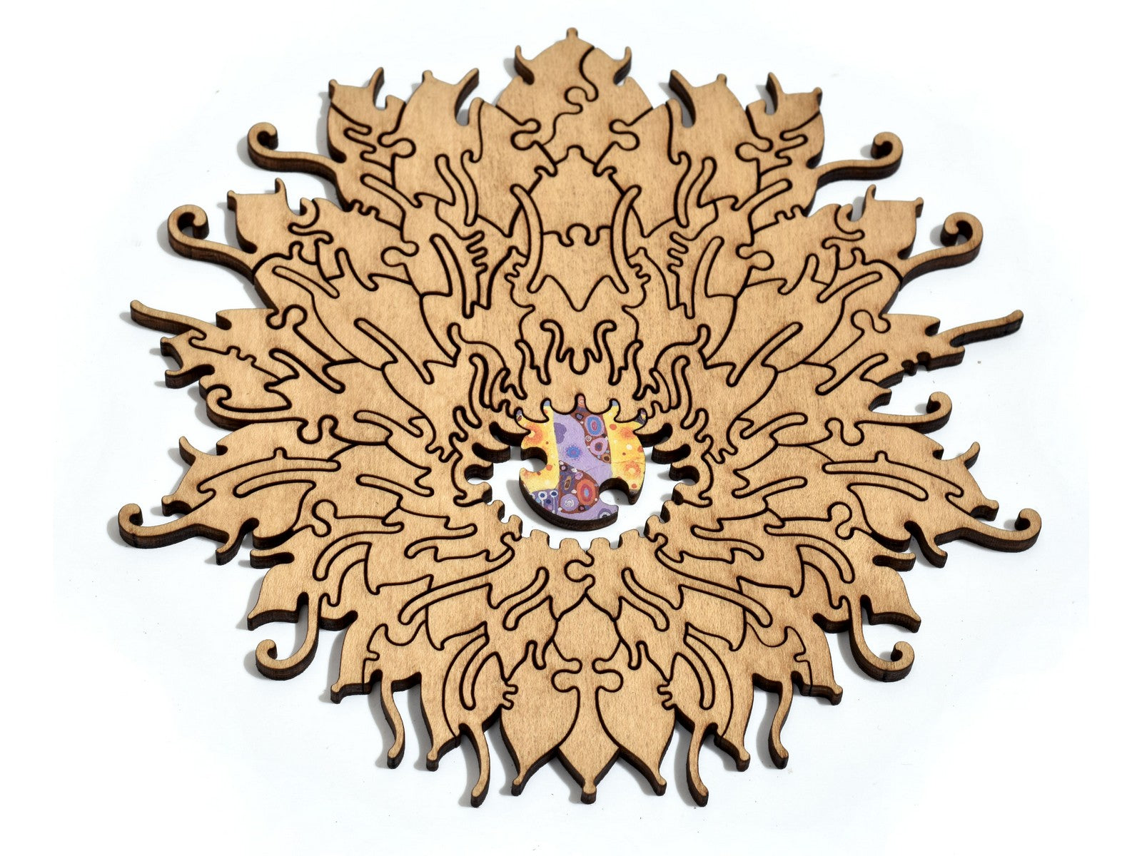 A closeup of some pieces shaped like an abstract flower.