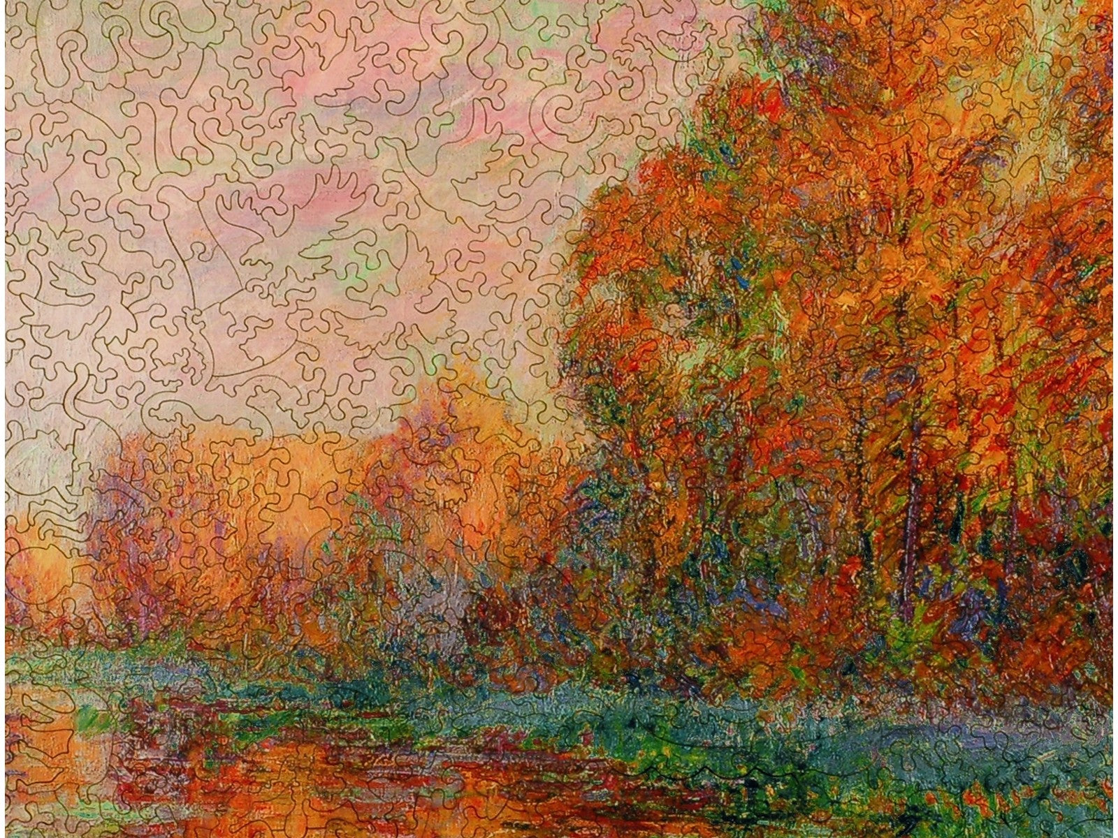 A closeup of the front of the puzzle, A River in Autumn.
