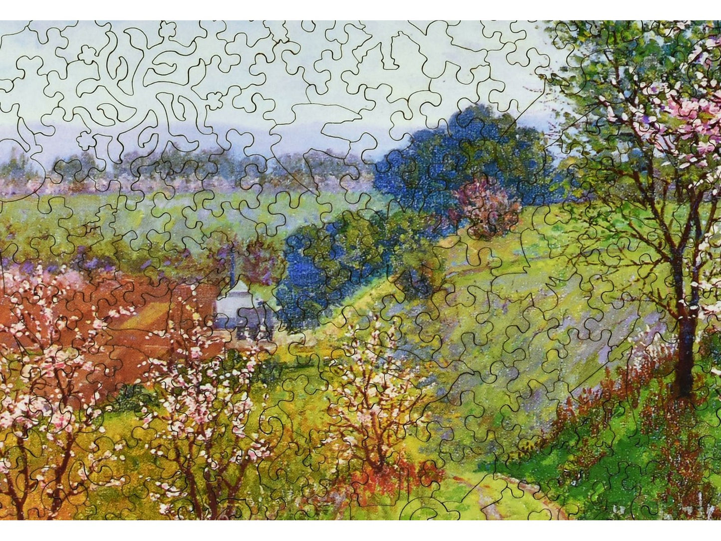 A closeup of the front of the puzzle, Road with Blossoming Trees.