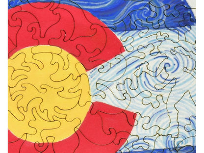 A closeup of the front of the puzzle, Colorado Flag Round, showing the detail in the pieces.