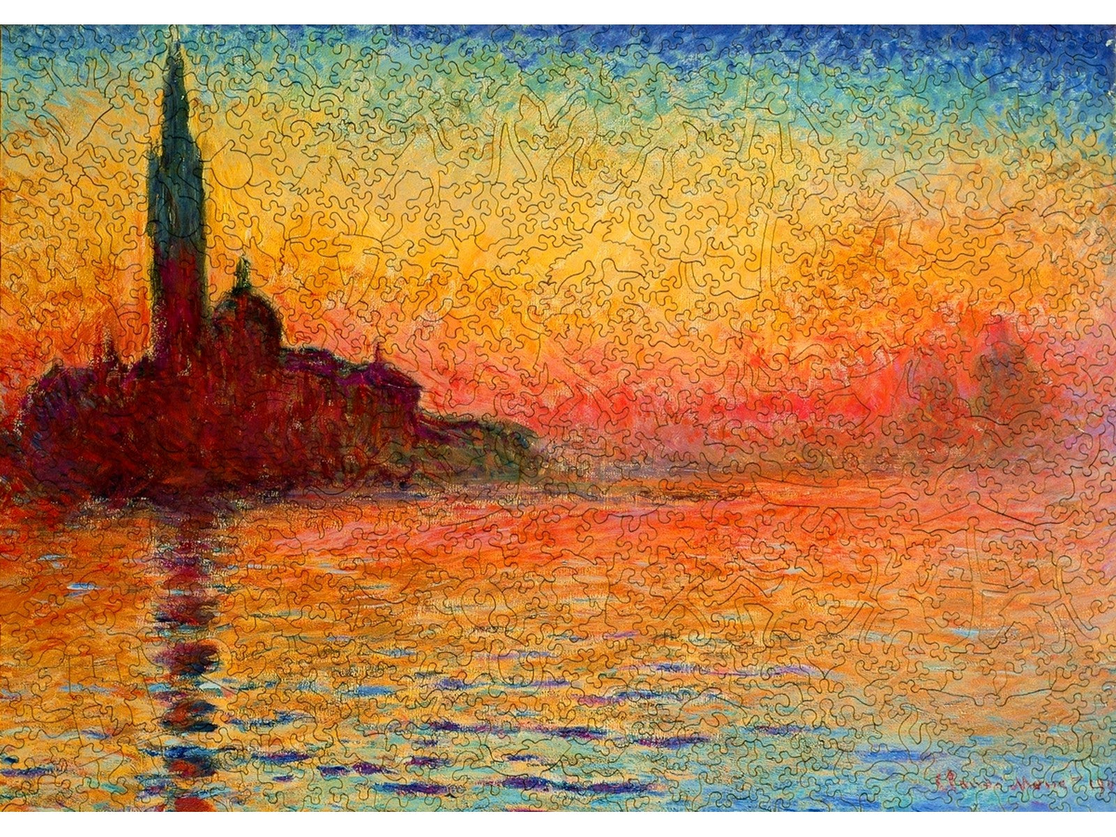 The front of the puzzle, San Giorgio Maggiore at Dusk, which shows the silhouette of a castle at sunset.