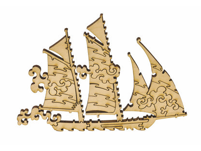 A closeup of pieces in the shape of a ship.